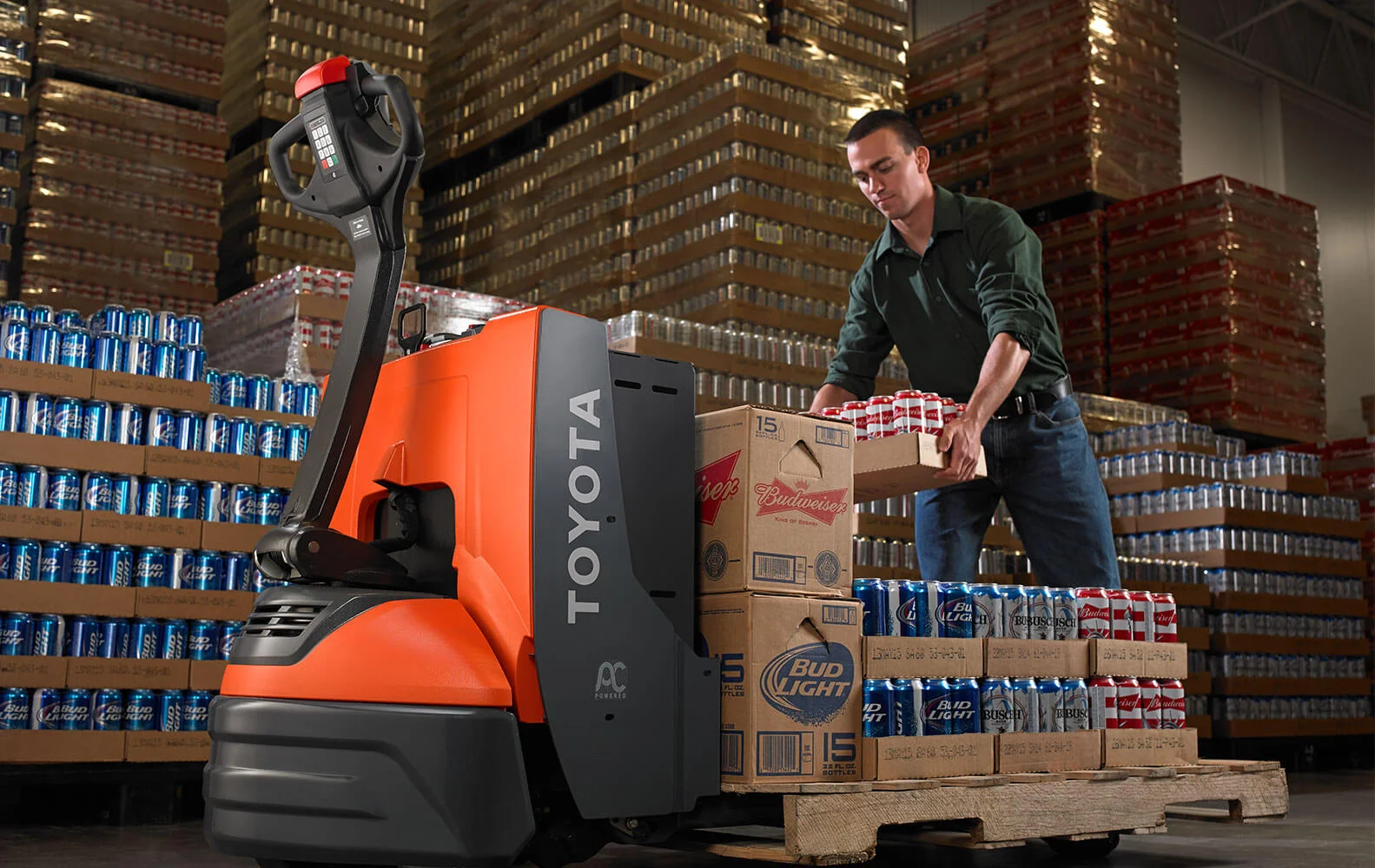pallet-jacks-and-walkies-in-warehouse-applications-1.webp Electric Pallet Jacks - Image 1